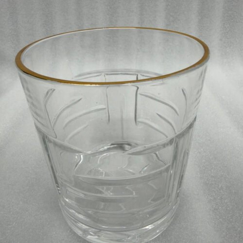 Set of six RCR-inspired crystal whiskey glasses with intricate textured patterns and a luxury gold-plated rim.