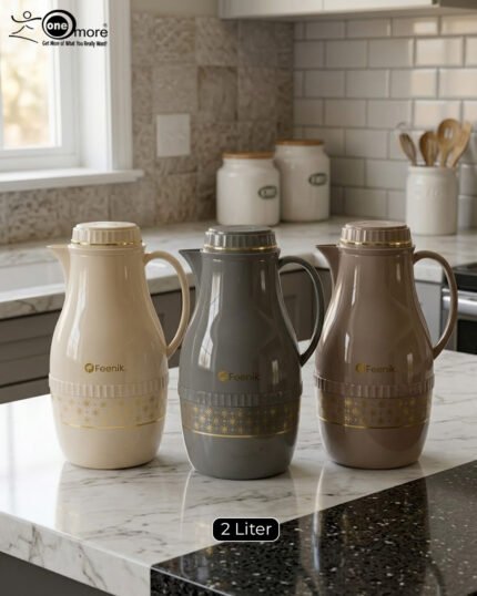 A trio of elegant 2-liter Feenik thermal flasks in cream, grey, and taupe featuring gold floral patterns on a marble kitchen countertop.