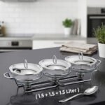 Three-section stainless steel food warmer from the Paramount Series featuring three 1.5L glass bowls with metal lids on a silver wire rack with tea light candle burners underneath.