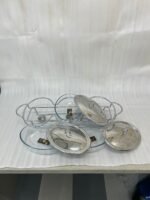 Three-section stainless steel food warmer from the Paramount Series featuring three 1.5L glass bowls with metal lids on a silver wire rack with tea light candle burners underneath.