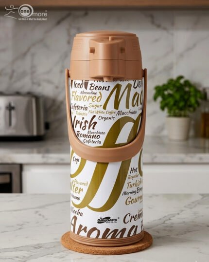 A 1.9-liter Day Days thermal airpot with a brown pump lid and a white body featuring coffee-themed typography, sitting on a marble kitchen countertop.