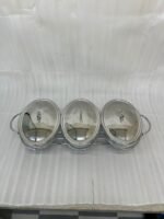 Three-section stainless steel food warmer from the Paramount Series featuring three 1.5L glass bowls with metal lids on a silver wire rack with tea light candle burners underneath.