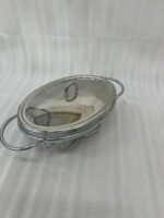 Three Paramount Series glass and stainless steel food warmers in 1.5L, 2L, and 3L sizes arranged on a dining table with tea light candles lit underneath.