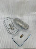 Three elegant Paramount Series food warmers in different sizes (1.5L, 2.4L, and 3L) featuring stainless steel lids and glass dishes with candle-lit buffet burners on a dining table.