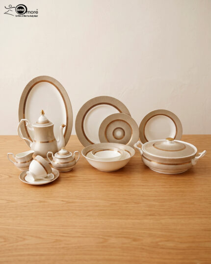 An elegant super bone china dinnerware set featuring a fine beige and gold-lined sunburst pattern, arranged neatly on a wooden table. The collection includes dinner plates, an oval platter, a tureen with a lid, soup bowls, a teapot, a creamer, a sugar bowl, and a teacup with a saucer