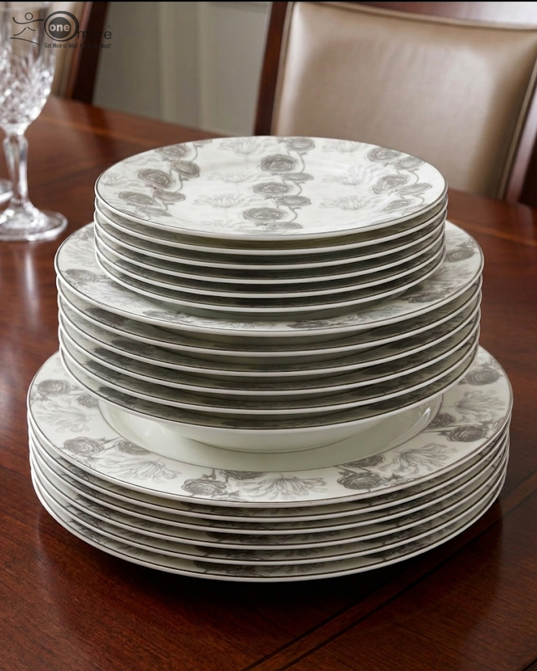 3 Stacked 18-piece super bone china plate set with grey floral patterns, including rice plates, deep plates, and quarter plates on a wooden dining table.