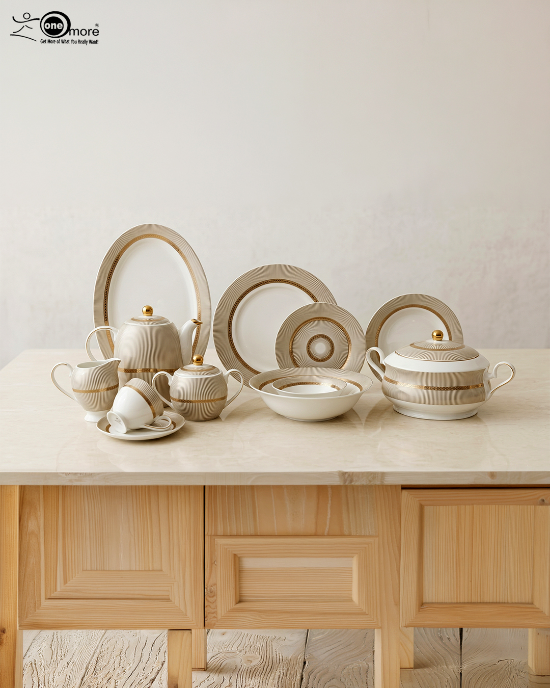 3 A luxury Super Bone China dinnerware set featuring a white porcelain base with intricate gold vertical ribbing and circular patterns, displayed on a marble countertop in 3.jpg