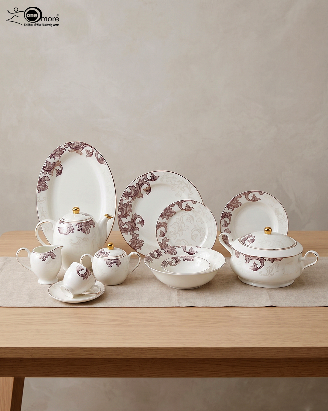 3 A luxury super bone china dinnerware set featuring a white base with intricate purple leaf patterns and gold accents, displayed on a wooden table