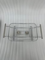 Two Paramount Series stainless steel food warmers in 2L and 3L sizes on a wooden table, featuring glass basins and polished metal lids.