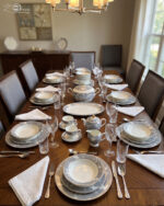A luxury super bone china dinner set featuring grey floral patterns and gold-tipped lids, displayed on a dark wooden table in "3.jpg"