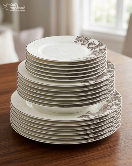 A stack of 18 premium super bone china plates featuring an elegant brown floral pattern on a wooden table, including rice, deep, and quarter plates.