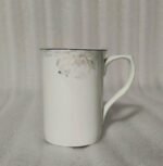 A 6-piece set of white bone china mugs as shown in 3.jpg, featuring a grey marble pattern near the rim and gold trim, displayed on a wooden desk next to books and gold spoons.