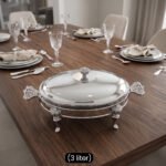 Premium 3-liter stainless steel chafing dish food warmer with decorative ornate stand on a luxury wooden dining table setup by One More.