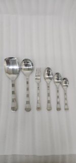 The premium 53-piece stainless steel cutlery collection featured in 6.jpg, displayed neatly on a wooden table to highlight the polished finish and design.