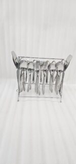 6.jpg displays an elegant 37-piece stainless steel cutlery set, featuring an assortment of tablespoons, teaspoons, forks, knives, and serving utensils arranged neatly on a wooden background to showcase the sophisticated design and finish.