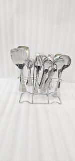 The image 6.jpg displays a selection of items from a 37-piece stainless steel cutlery set, neatly arranged on a wooden background, showcasing the sleek design and finish of the spoons, forks, and serving utensils.