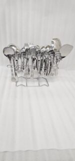The premium 53-piece stainless steel cutlery collection featured in 6.jpg, displayed neatly on a wooden table to highlight the polished finish and design.