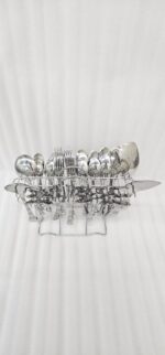 The premium 53-piece stainless steel cutlery collection featured in 6.jpg, displayed neatly on a wooden table to highlight the polished finish and design.