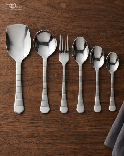The premium 53-piece stainless steel cutlery collection featured in 6.jpg, displayed neatly on a wooden table to highlight the polished finish and design.
