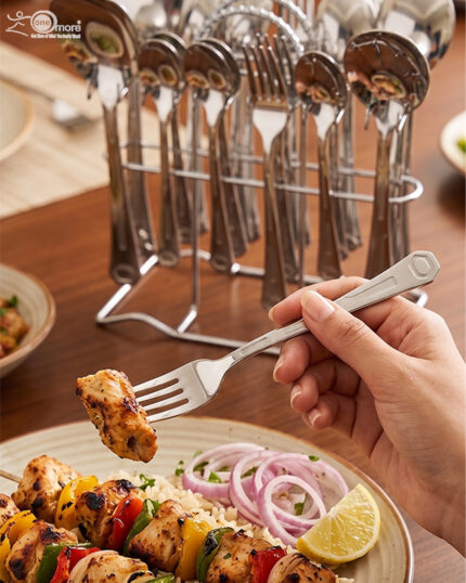 A high-quality 37-piece stainless steel cutlery set arranged neatly, including various spoons, forks, and knives, as displayed in 7.jpg.