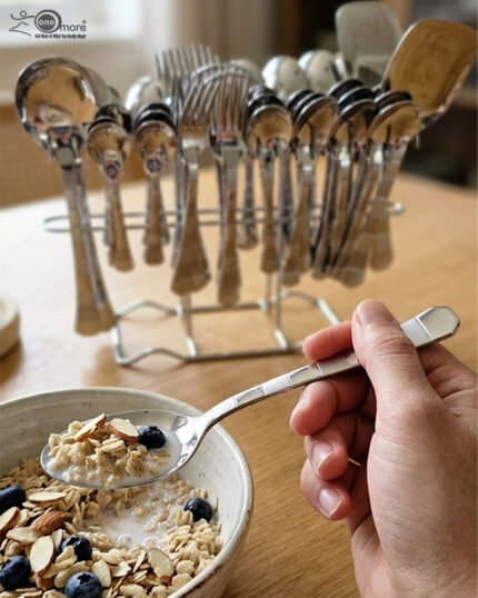The premium 53-piece stainless steel cutlery collection featured in 6.jpg, displayed neatly on a wooden table to highlight the polished finish and design.