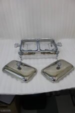 Double slot premium stainless steel chafing dish 1.5x2 liter buffet server on a wooden dining table.