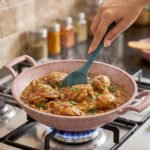 A 30cm pink granite coated non-stick open wok by OneMore, perfect for healthy cooking and easy cleaning in a modern kitchen.
