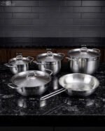 A set of premium Made in Turkey non-stick steel pots and pans in various sizes ranging from 16cm to 24cm, displayed on a kitchen counter at OneMore.