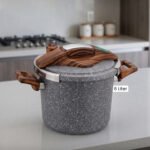 6L Turkish non-stick granite cooker with wood-finish handles and lid, showcased in a modern kitchen setting at OneMore.