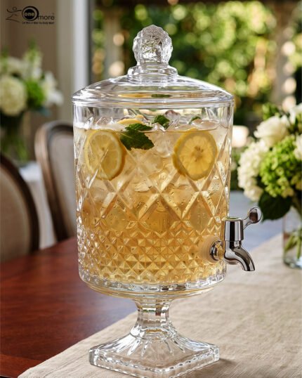 Elegant 4.5 liter glass beverage dispenser featuring a diamond-cut pattern and metal spigot on a table, as seen in 2.jpg.