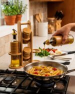 A stylish set of two glass oil dispensers and two salt shakers housed in a bamboo wooden stand, as seen in 1.jpg.