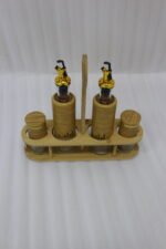 2.jpg shows a modern kitchen organizer set including two glass oil bottles with pourers and two salt/spice shakers, all encased in bamboo wood accents and held in a matching wooden stand.
