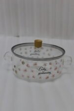 Alt Text: One More 2.5L square glass pot with floral prints, clear glass lid, and a wooden knob resting on a marble countertop.