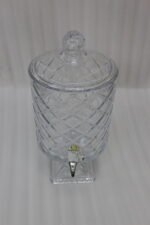 Elegant 4.5-liter diamond-cut glass beverage dispenser filled with infused lemon and cucumber water on an outdoor garden party table, featured in 2.jpg.