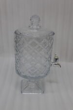Elegant 4.5-liter diamond-cut glass beverage dispenser filled with infused lemon and cucumber water on an outdoor garden party table, featured in 2.jpg.