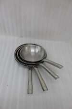 A set of four Made-in-Turkey stainless steel non-stick fry pans in sizes 20cm, 22cm, 24cm, and 26cm arranged on a kitchen counter.