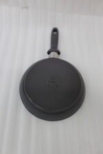 Three sizes of grey diamond-infused non-stick frying pans (20cm, 22cm, 26cm) arranged on a kitchen counter.