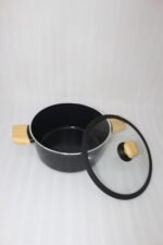 Set of four premium Turkish diamond-infused non-stick pots in sizes 20cm, 22cm, 24cm, and 26cm displayed on a kitchen counter, available at OneMore Pakistan.
