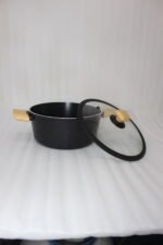 Set of four premium Turkish diamond-infused non-stick pots in sizes 20cm, 22cm, 24cm, and 26cm displayed on a kitchen counter, available at OneMore Pakistan.