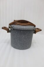 6L Turkish non-stick granite cooker with wood-finish handles and lid, showcased in a modern kitchen setting at OneMore.