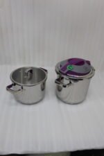 A 2-in-1 non-stick stainless steel cooker set in 6L and 8L sizes, made in Turkey, displayed on a kitchen counter, available at OneMore.