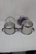 A 2-in-1 non-stick stainless steel cooker set in 6L and 8L sizes, made in Turkey, displayed on a kitchen counter, available at OneMore.