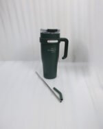 : An array of colorful 1.2L stainless steel tumblers with handles and clear lids displayed on a kitchen counter