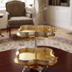 Luxury 2-tier decorative serving tray with textured gold base, silver borders, and ornate floral top handle.