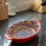 9.5-inch decorative Marrakesh ceramic serving bowl with colorful Moroccan mandala patterns on a kitchen countertop