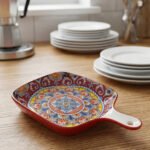 6.5-inch decorative Marrakech square ceramic serving platter with intricate mandala pattern and handle on a wooden countertop