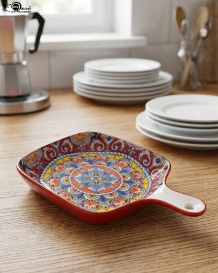 6.5-inch decorative Marrakech square ceramic serving platter with intricate mandala pattern and handle on a wooden countertop