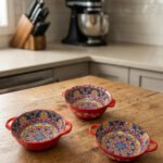 Decorative Marrakesh double handle ceramic serving bowls with colorful Moroccan pattern on a wooden kitchen island