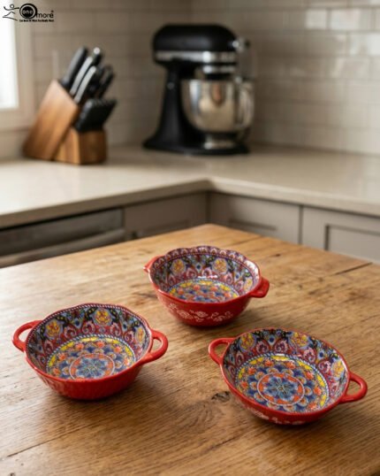 Decorative Marrakesh double handle ceramic serving bowls with colorful Moroccan pattern on a wooden kitchen island