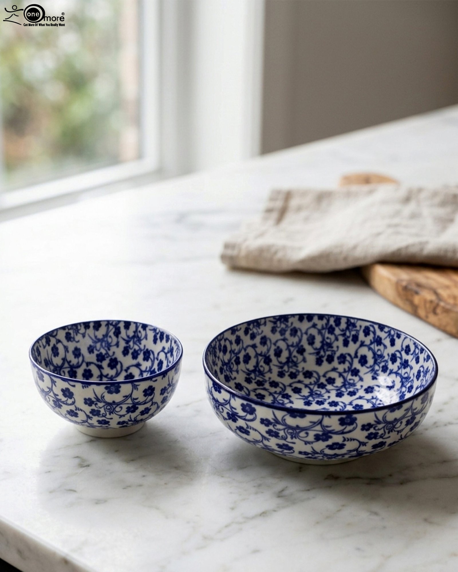 1 Pair of blue and white handcrafted decorative Marrakesh ceramic bowls in 5-inch and 8-inch sizes on a marble countertop